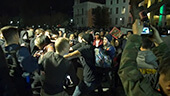 Still image of A fight breaks out in the middle of a protest.